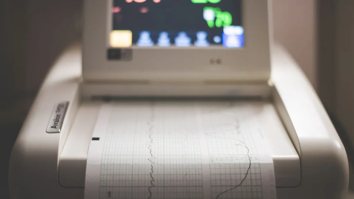 Detailed image of an electronic fetal monitoring machine showing heart rate and contraction data.
