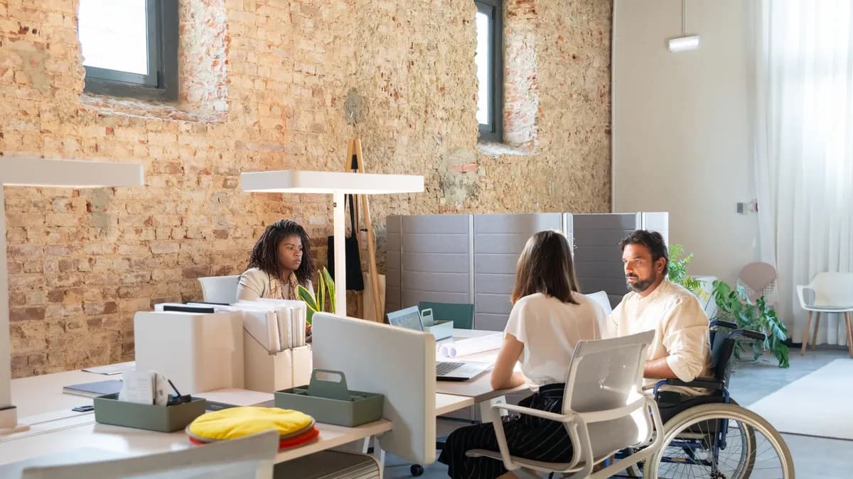 Diverse team of professionals working together in a stylish modern office.