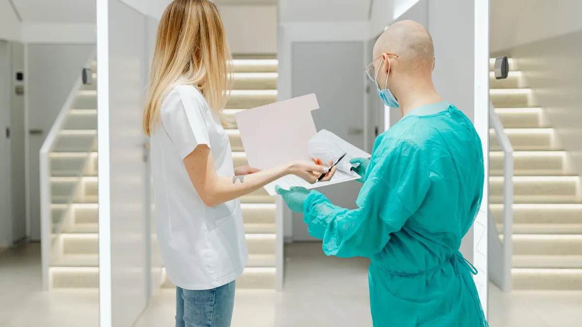 Doctors collaborating in a bright clinic, highlighting teamwork and healthcare.